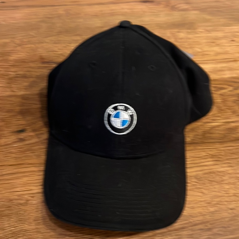 Brand new BMW hat. Never worn. Came with car.
